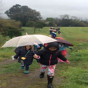 Children on the trail and in the rain at Stivers Lagoon