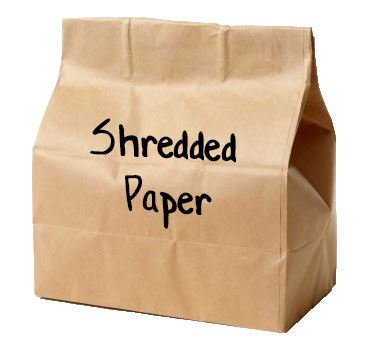 Shredded paper in a closed paper bag, recylce