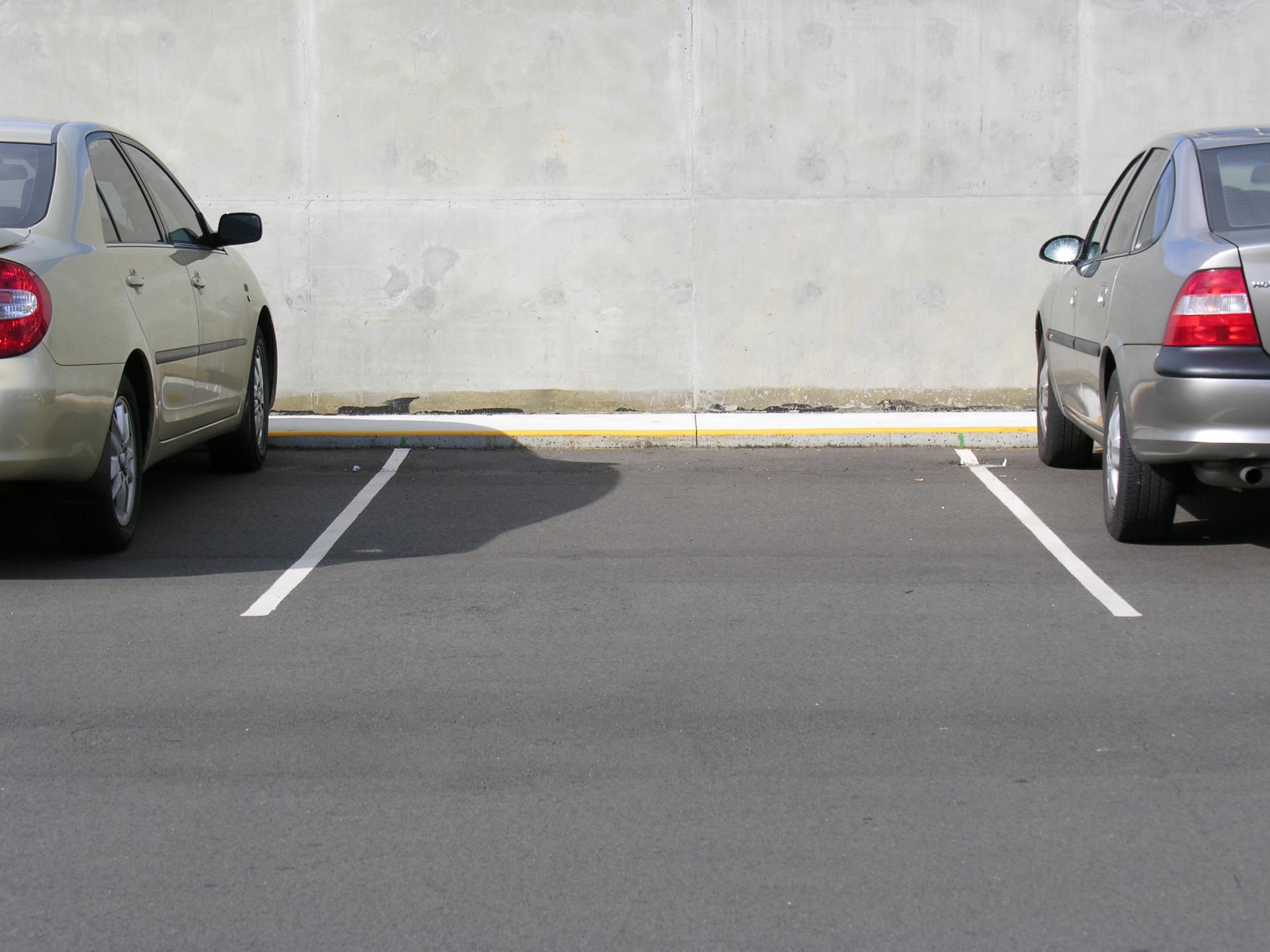 two cars on pavement