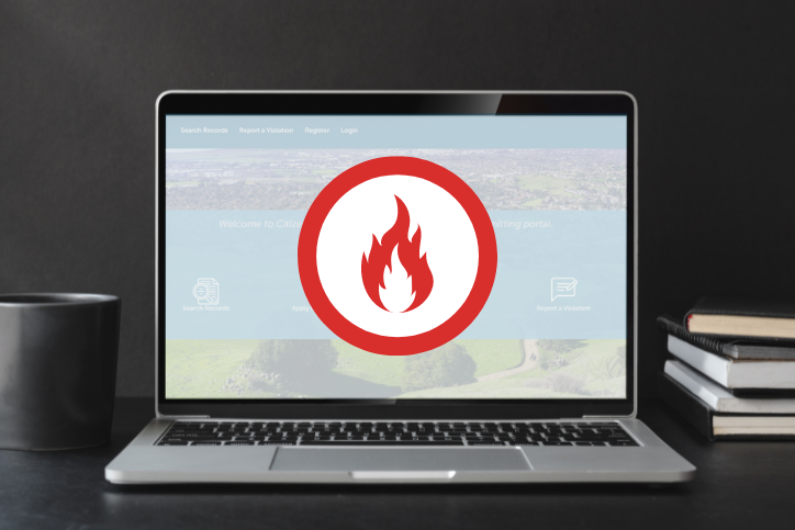 Laptop with red fire symbol on screen