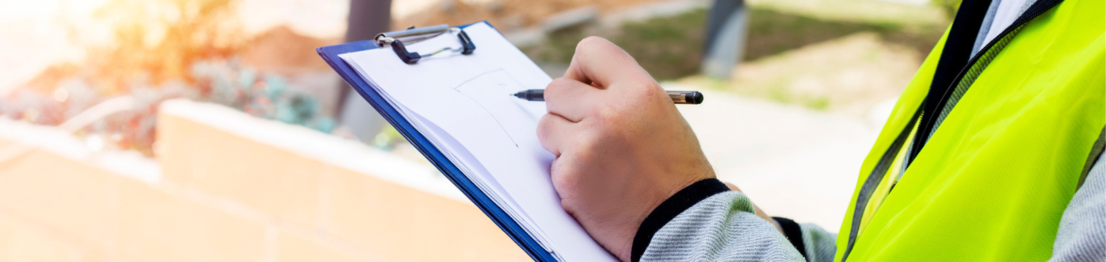 Photo of person holding clipboard