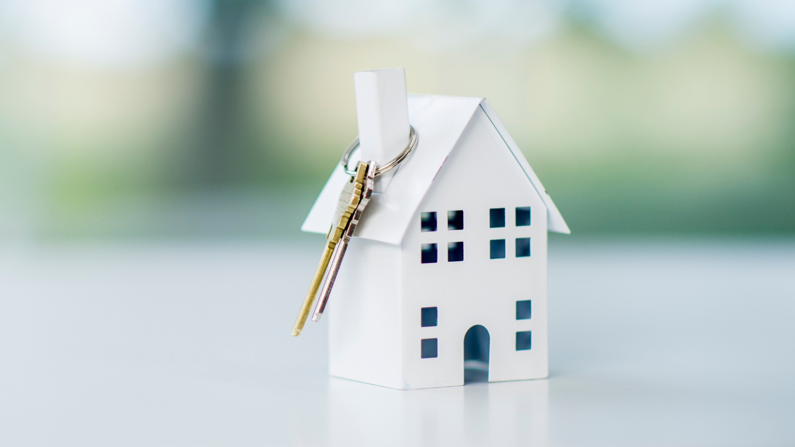 Model of house with key