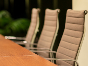 Board room with three chairs